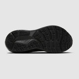 Black athletic shoe sole on a light gray background