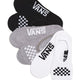 Three pairs of Vans socks in black, gray, and white on a beige background