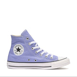 A single Converse All Star high-top sneaker in a light lavender purple canvas, featuring white laces, a white rubber toe cap and midsole, and the signature circular black star logo patch on the side.