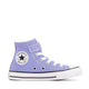A single Converse All Star high-top sneaker in light purple canvas with white laces, a white rubber toe cap and midsole, and a black circular ankle patch.