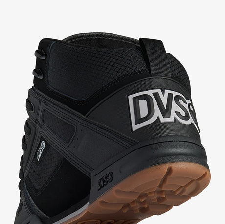 Black boot with 'DVS' branding on a white background