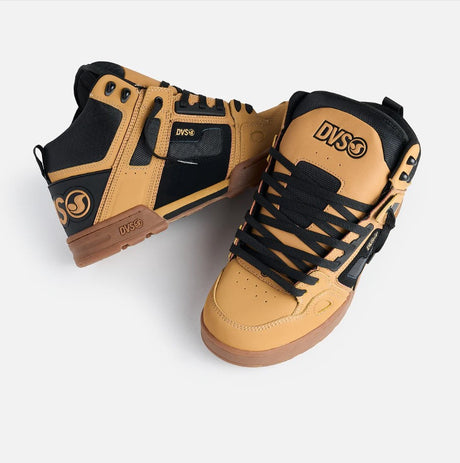 Tan and black sneakers with DVS logo on a white background