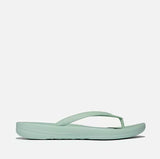 Mint green sandal on a white background