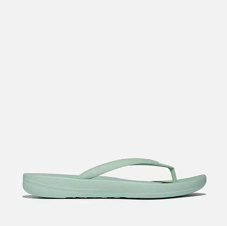 Mint green sandal on a white background