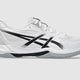 White Asics athletic shoe with black accents on a light gray background.  Can be purchased at www.sneakersplus.ca