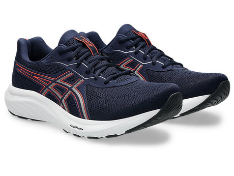 Navy running shoes with red accents on a white background