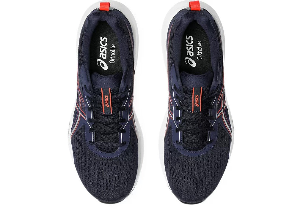 Navy running shoes with red accents on a white background