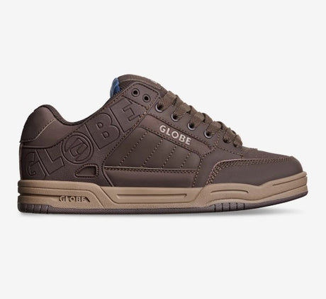 The side of a brown GLOVE skate shoe with a tan sole 
