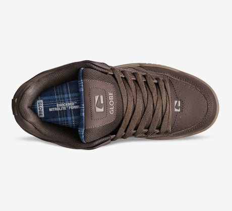 A top-down view of a brown GLOBE skate shoe, showing the brown laces, textured brown overlays, and a blue plaid lining on a light gray background.