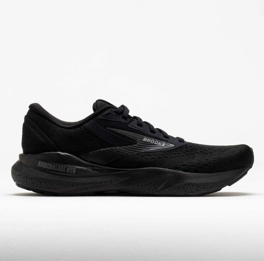 Black running shoe with 'Brooks' branding on a white background