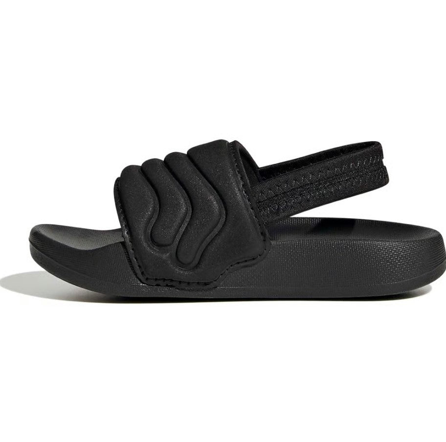 Black sandal with a strap on a white background