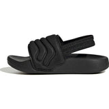 Black sandal with a strap on a white background