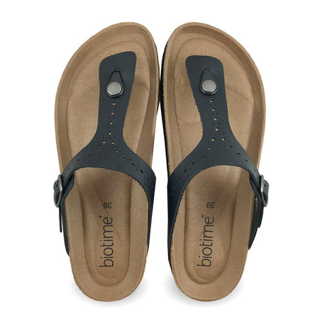 Pair of Biotime brown sandals with black straps on a white background from Sneakers Plus