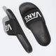 Black slides with Vans logo on a white background