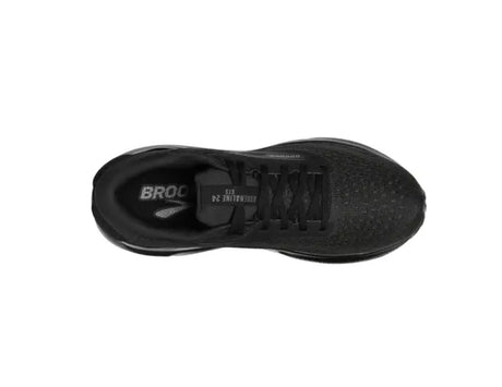 Black sneaker with 'Brooks' branding on a white background