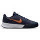 Side view of navy Nike shoes with an orange-bronze swoosh and a white and black sole