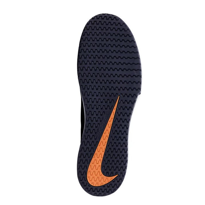 A navy coloured shoe sole with an orange swoosh incorporated into the tread pattern