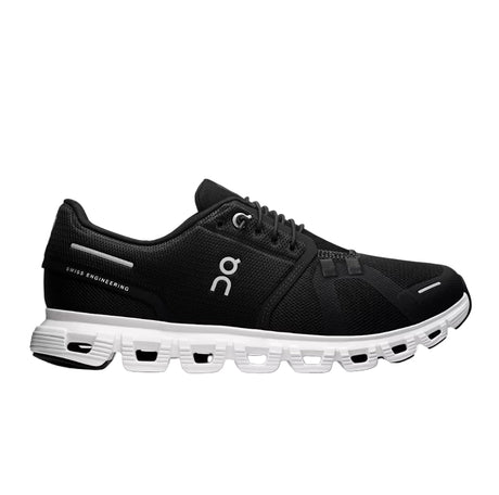 Black running shoe with white sole on a light gray background