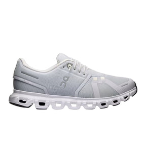 Grey and white running shoe on a light gray background