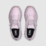 Pair of pink sneakers with 'on' branding on a light gray background