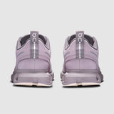 Pair of purple running shoes with visible 'On' branding on a light gray background