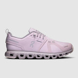 Pink running shoe on a light gray background