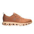 Brown/orange running shoe with a unique sole design on a white background