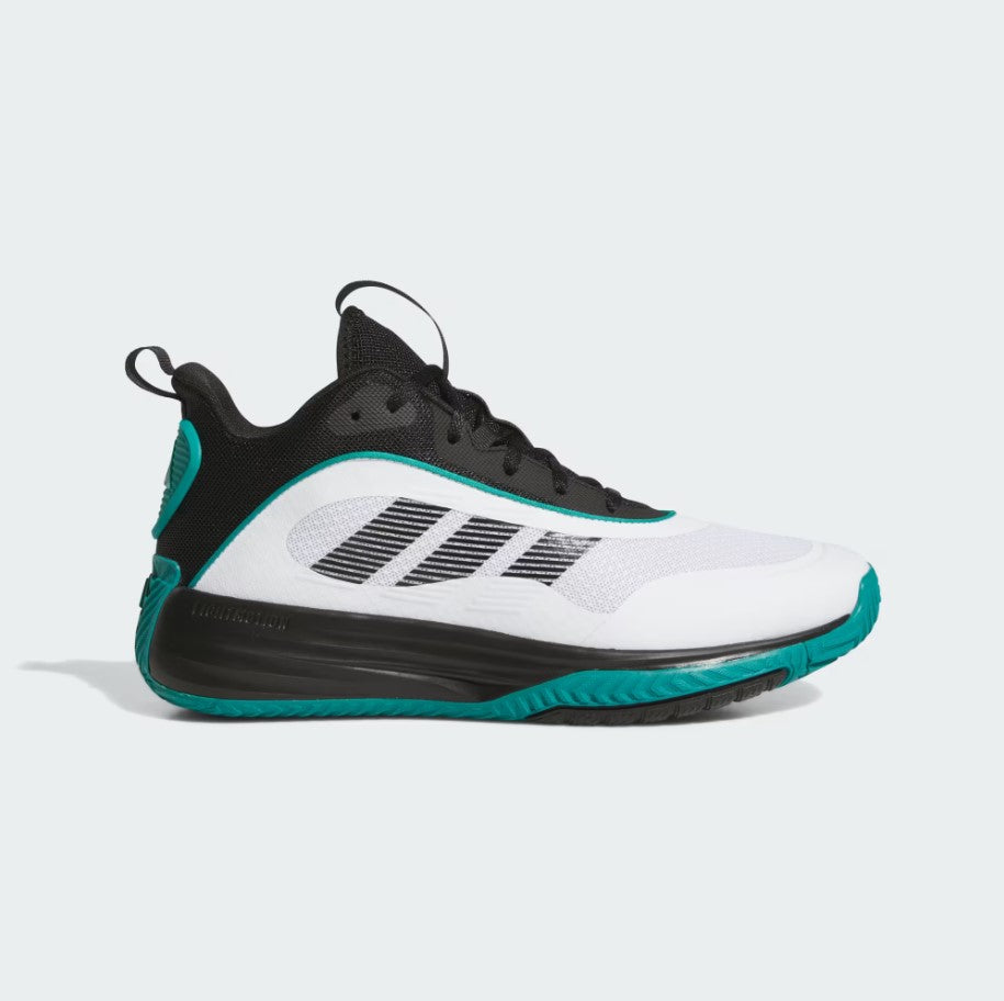 White and black sneaker with teal accents on a light gray background