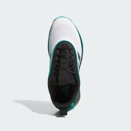 White and black athletic shoe with teal accents on a light gray background