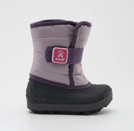 a light purple kamik snow boot from the side, showing a Velcro sap and black rubber food bed