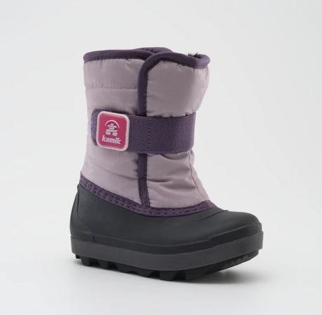 a light purple kamik snow boot from the side, showing a Velcro sap and black rubber food bed