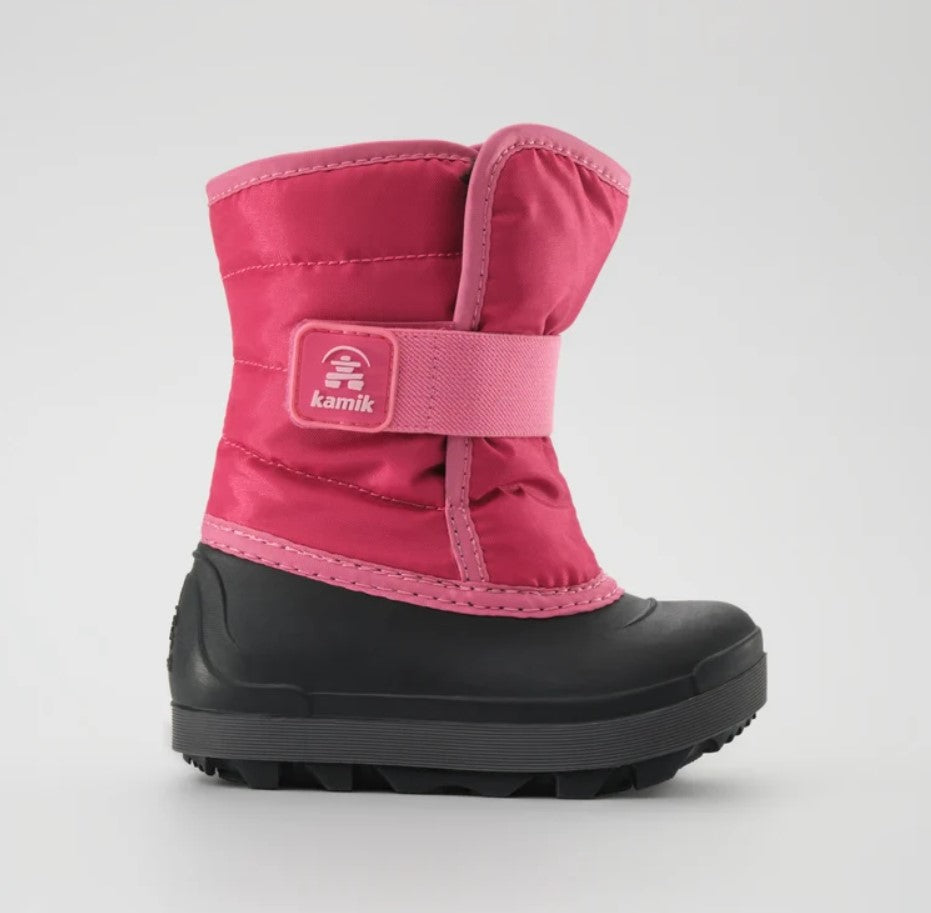 a bright pink kamik snow boot from the side, with a black, rubber foot bed