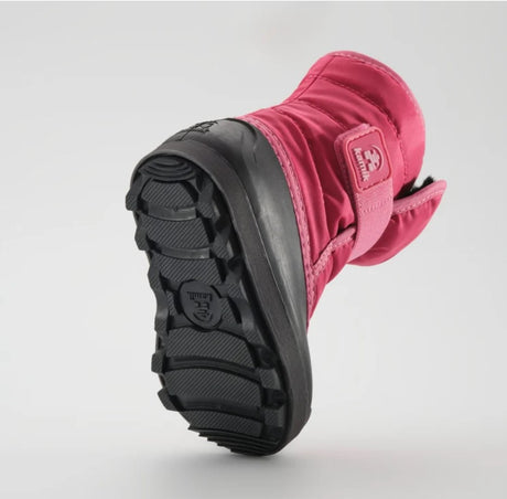 a bright pink kamik boot from the bottom, featuring a black rubber bottom sole