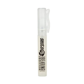 Clear bottle with black text saying "Sector 9 Nineball Bearing Butter" on a white background