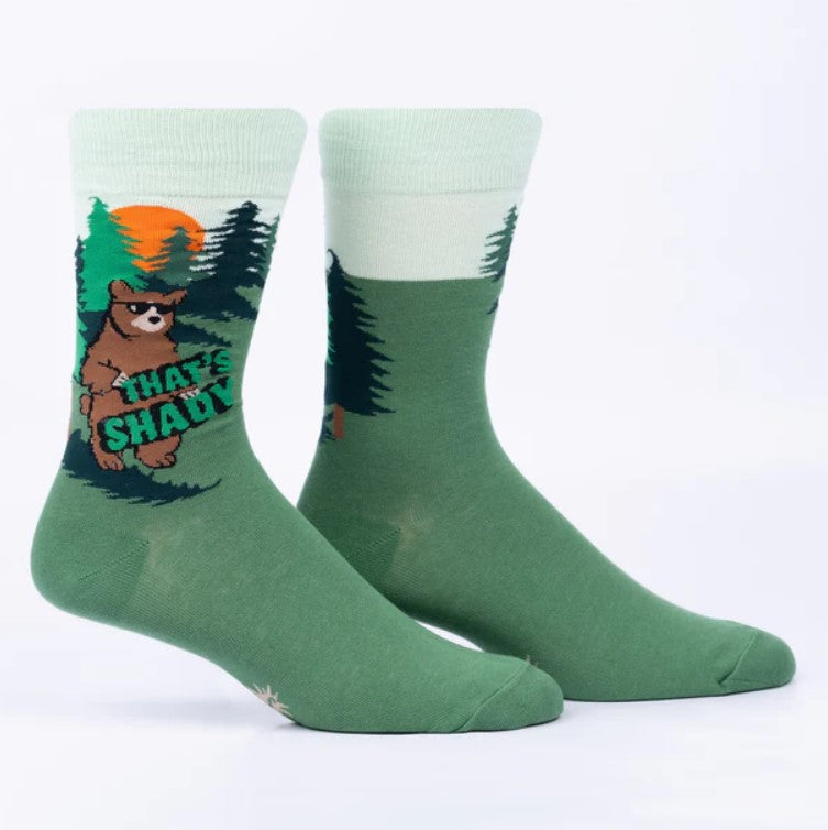 Green socks with a bear graphic and text on a white background