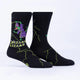 Black socks with a wizard lizard design on a white background