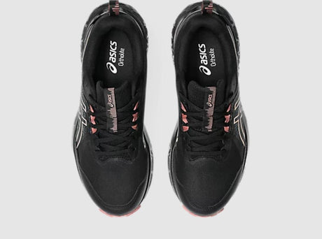 Black running shoes with pink accents on a white background