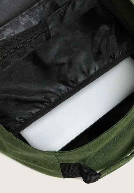 Green bag with a black checkered interior on a light gray background