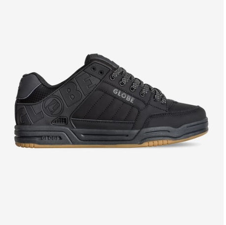 Black sneaker with 'Globe' branding on a white background
