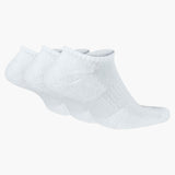 Three pairs of white ankle socks on a white background