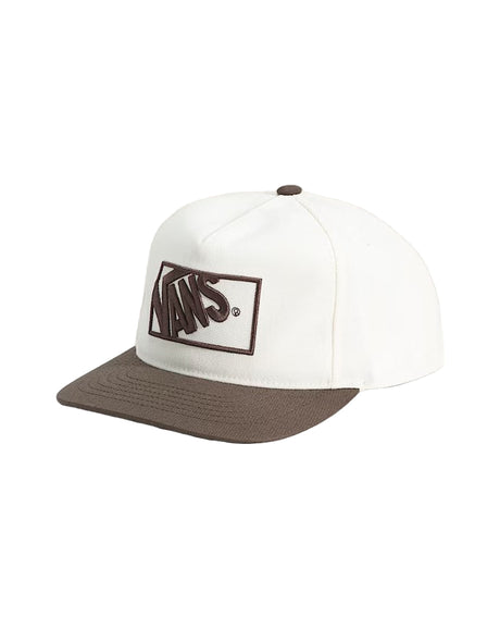 White and brown cap with Vans logo on a light gray background