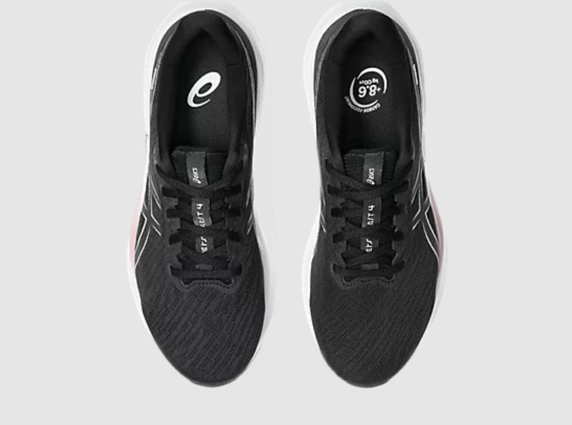 Black running shoes with brand logo on a light gray background