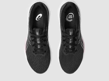 Black running shoes with brand logo on a light gray background