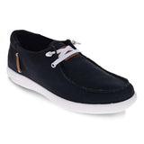 Black casual shoe with white slip in laces on a white background